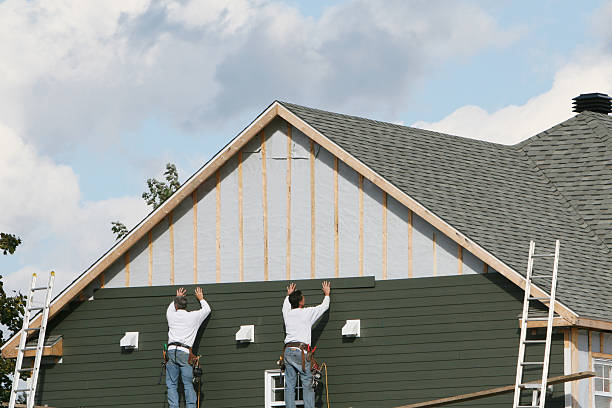 Professional Storm Damage Siding Repair technician working in Seagrove, NC